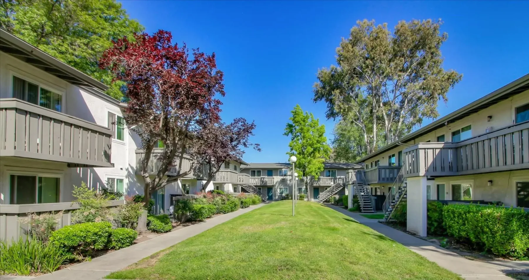 Landscaped paths between residential buildings