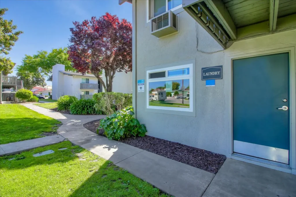Exterior of laundry building with landscaped paths